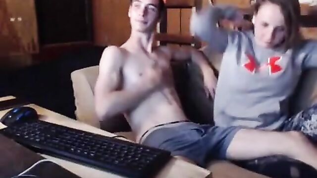 Real siblings napping on the couch Webcam - 1 image